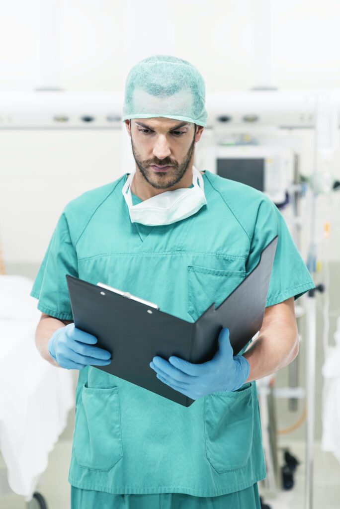 Medical nurse worker examining a medical report